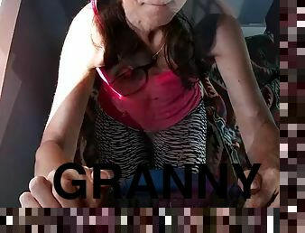 Sexy granny wearing glasses sucks and drains big cock