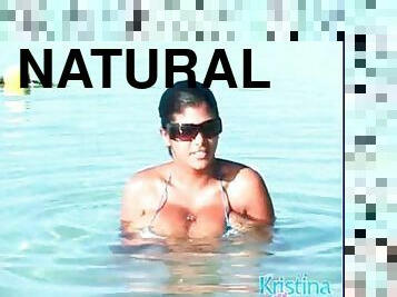 Kristina Milan has huge natural tits in bikini