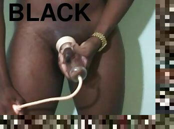 Black guy uses penis pump to cum