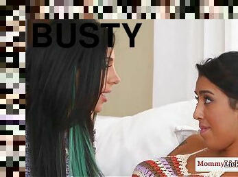Busty milf teaches girl to lesbian skills