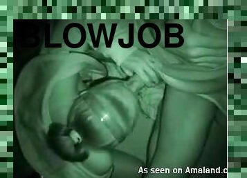 Cute blonde gives night vision blowjob