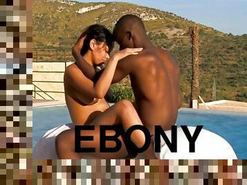 Ebony lust on display outdoors