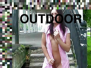 Teen unbuttons dress and flashes outdoors