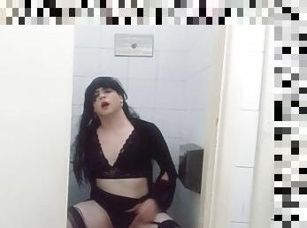 Trans Felixa in sexy black lingerie fucking with a dildo in a public bathroom