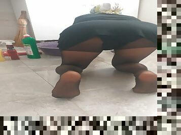 Cleaning lady in hijab and pantyhose