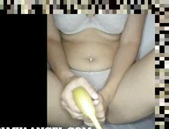 Indian Slut fucks herself with a Banana