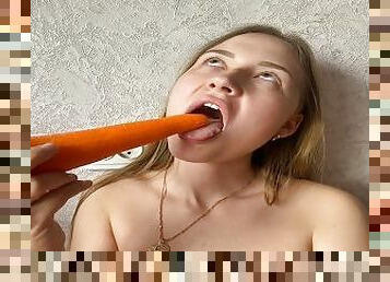 The girl wanted a huge cock and decided to fuck herself with a carrot. Huge carrot in pussy