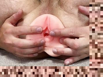 Insert a silicone vagina into anal and fuck with dildo and sex machine close up