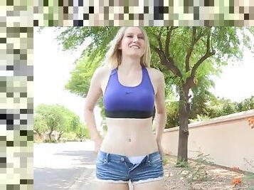Sexy blonde teen shows her sexy body while in the park