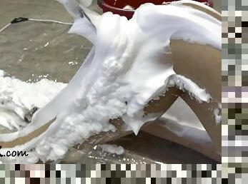 My nude body is covered in foam, then slowly, bit by bit I use an ice scraper to remove the foam