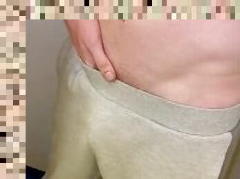 Young gay guy pissing in pants
