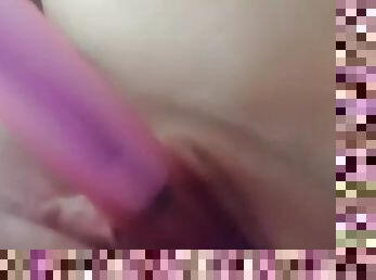 Bright pink vibrator in her juice wet pussy