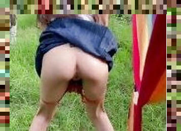 College girl peeing in a public park