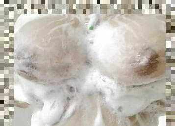 teen plays with big soapy titties while showering