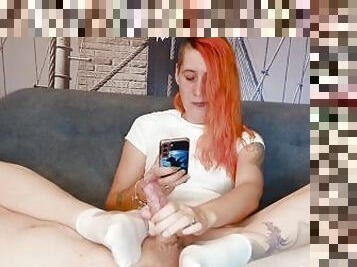 Teaseing his cock while watching TV and playing on phone. 3 ruined orgasms.