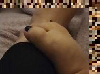 Hot mama's chubby feet playing footsie together