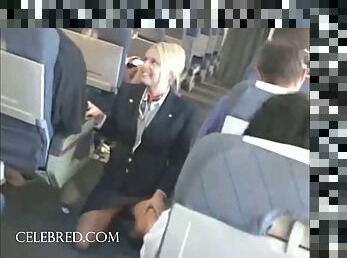 Sexy stew sucking and stroking dick on plane uniform